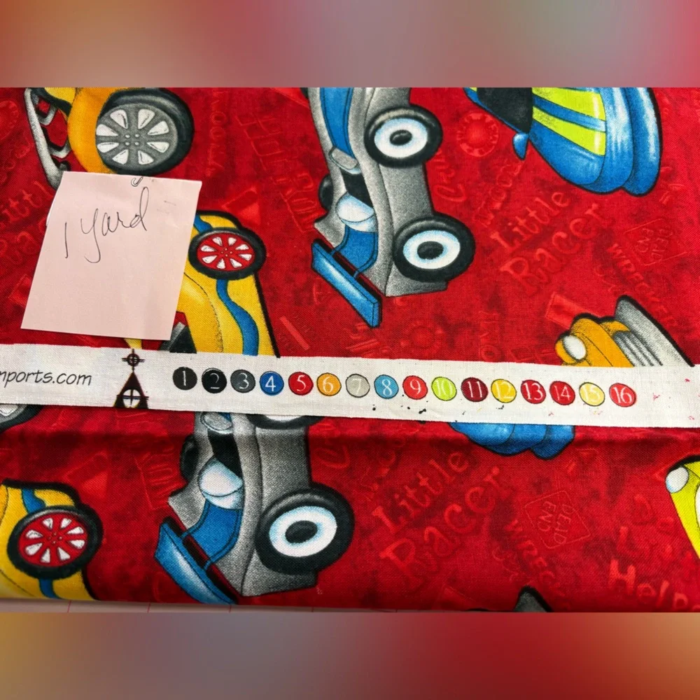 SSI Little Hot Rods fabric. Multicolor race cars on red background. 1 yard cut.